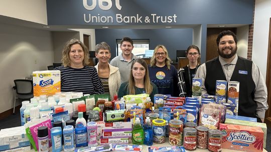 Auburn Branch of Union Bank and Trust Donate to Catholic Social Services