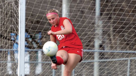 Lexington Downs the ‘Dogs in Home Opener