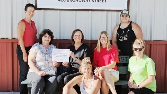 Spring Creek Agency & IMT Insurance Award $1,000 to Sterling Community Assoc.