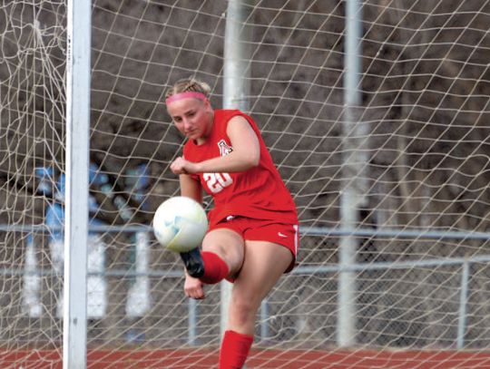 Lexington Downs the ‘Dogs in Home Opener