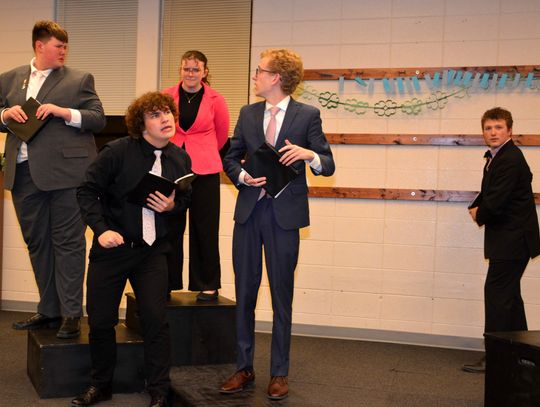 Bulldog Speech Presents Before Family and Friends