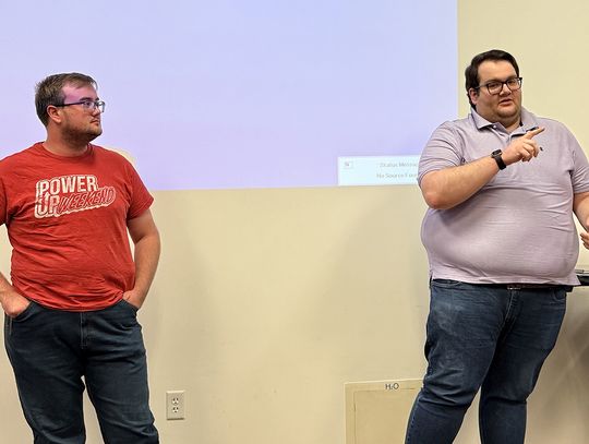 Multiple Speakers Address APS Patrons at Bond Informational Meeting