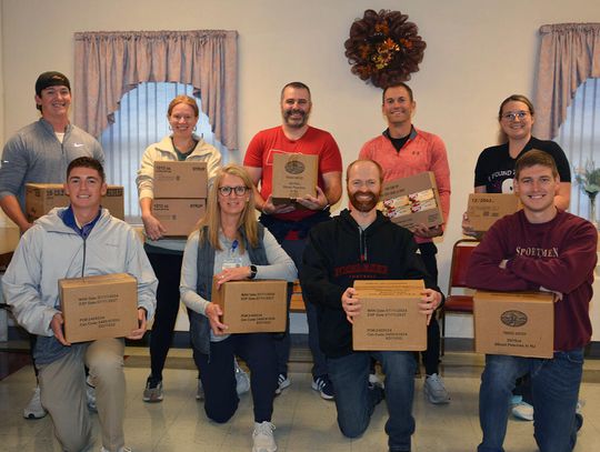 Nemaha County Hospital Therapy Staff Takes Time to Unload BackPack Food Delivery