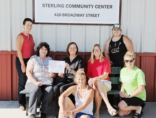 Spring Creek Agency & IMT Insurance Award $1,000 to Sterling Community Assoc.