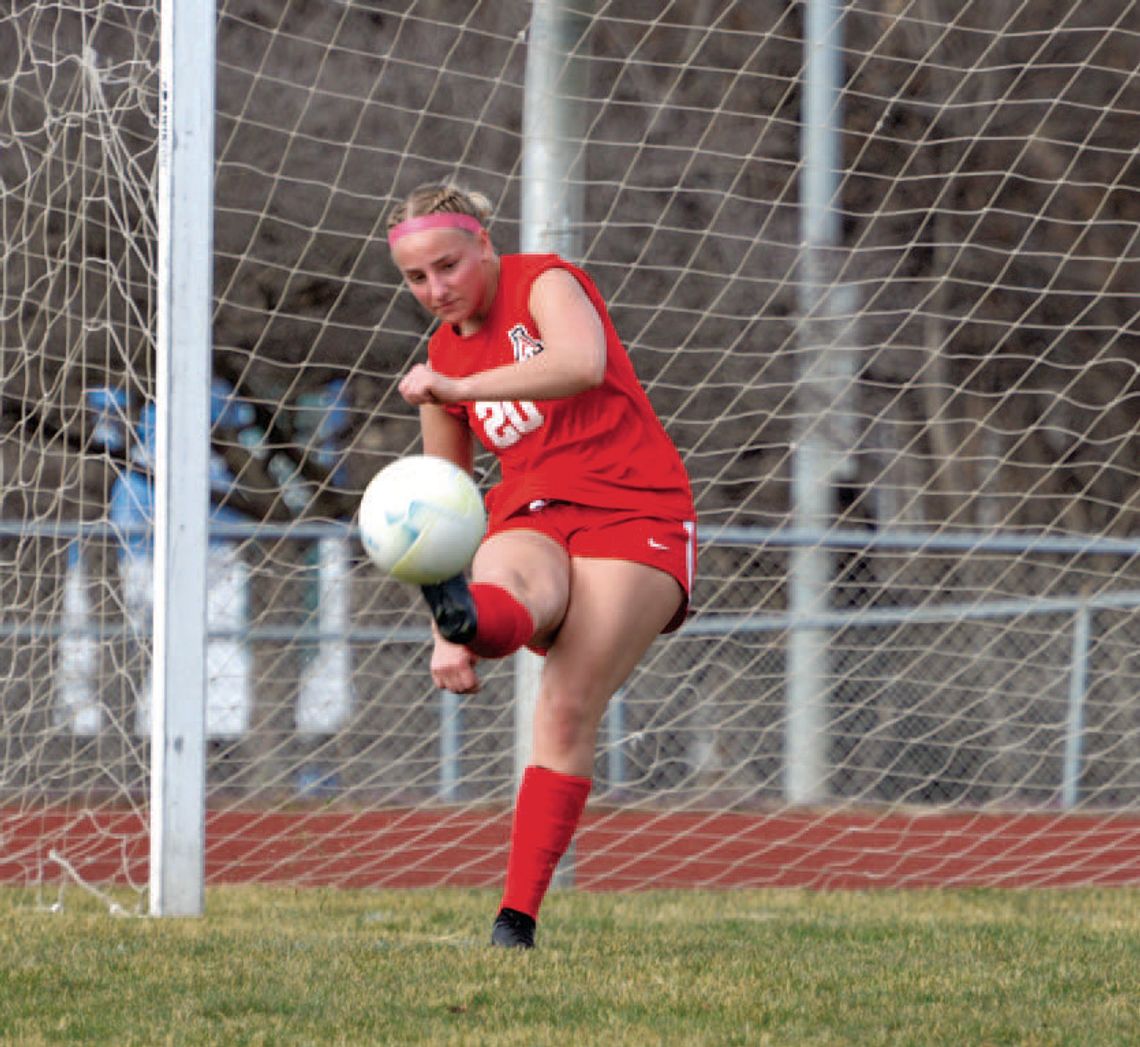 Lexington Downs the ‘Dogs in Home Opener