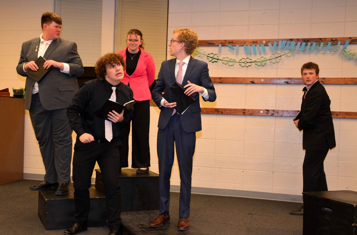 Bulldog Speech Presents Before Family and Friends