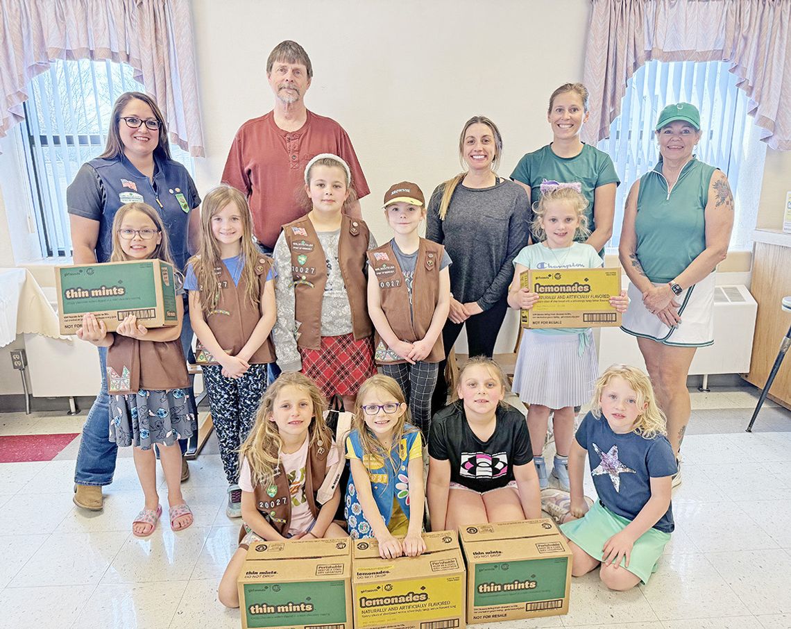Girl Scouts Donate Cookies To Auburn BackPack Program