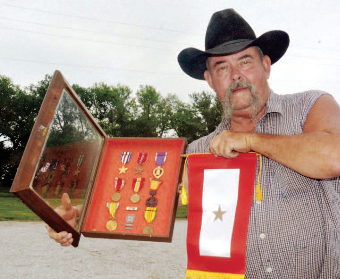 Gold Star Banners Presented to Families of Sgt. Larry R. Rieken and Specialist 4 Gary Schmidt, Killed in Action in Vietnam